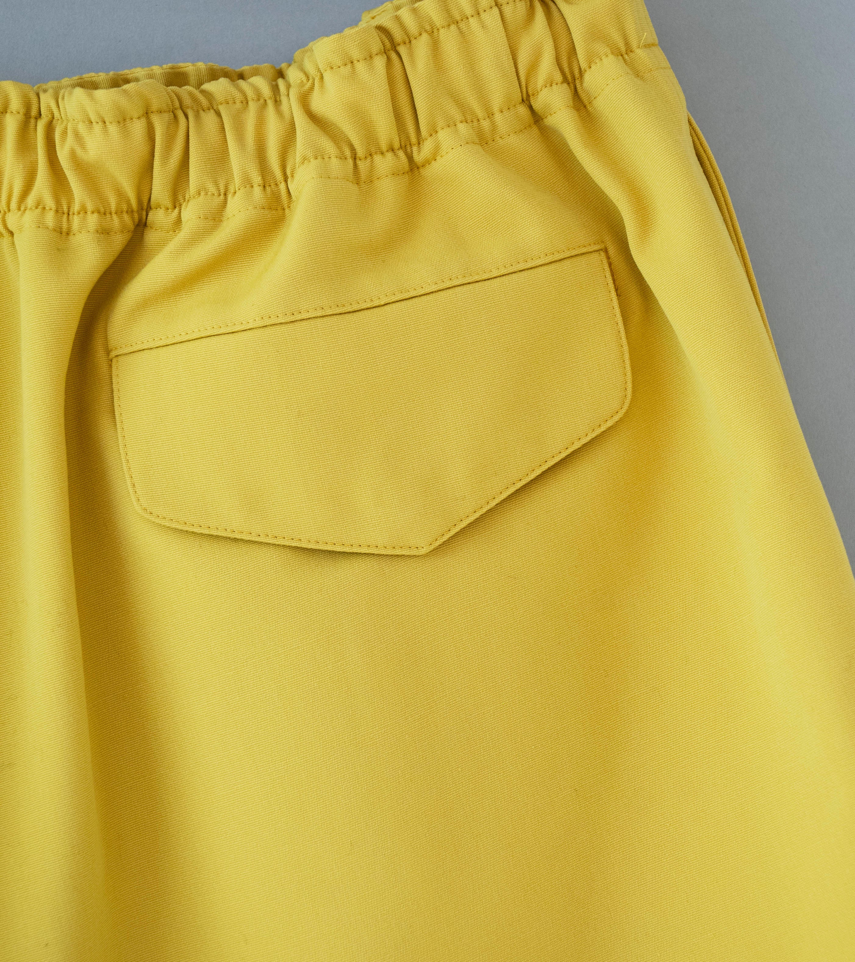 Auralee 'Wool Max Canvas Shorts' (Mustard Yellow) - Image 6